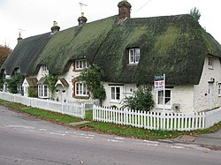 Row of thatched cottages on the High Street - geograph.org.uk - 1566304.jpg