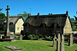 Cottesmore War Memorial and Cottages Old and New.JPG