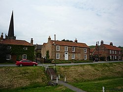Cottages and Church - Bishop Wilton - geograph.org.uk - 1429472.jpg