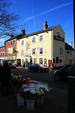 The Red Lion and flower seller - geograph.org.uk - 1752493.jpg