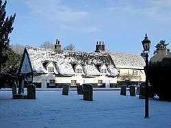Trumpington, thatched cottages in the snow - geograph.org.uk - 1654402.jpg