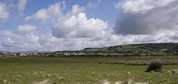 Llandanwg and Llanfair Gwynedd across Y Maes.jpg