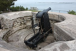 British 64 Pounder Rifled Muzzle-Loaded (RML) Gun on Moncrieff disappearing mount, at Scaur Hill Fort, Bermuda.jpg