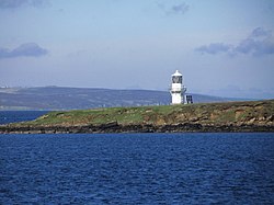 On board ferry from Lyness to Houton - View to Calf of Cava & Lighthouse (geograph 3745681).jpg
