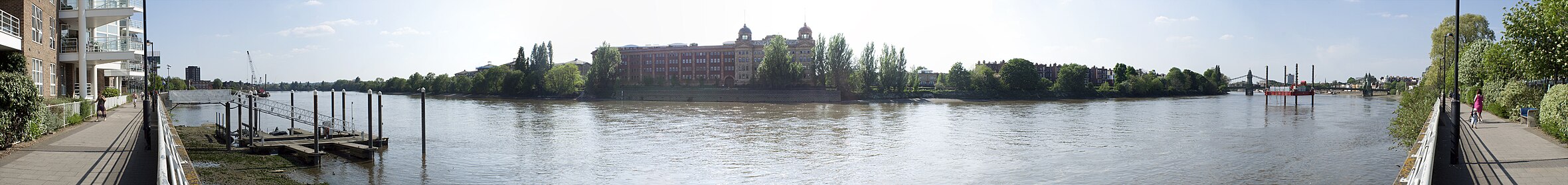 A panoramic view looking of the Thames at Hammersmith, opposite the Harrods Repository.