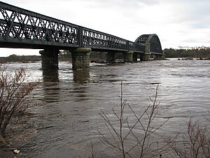 The Spey in spate at the Garmouth old rail bridge