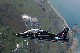 A RAF Hawk T1 flying over RAF Valley.