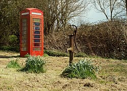The village pump and telephone box at Chignall St. James - geograph.org.uk - 765041.jpg
