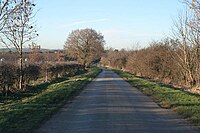 Modern road surface on the line of the Roman road