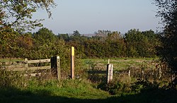 Stile and field on footpath to Sutton - geograph.org.uk - 2105839.jpg