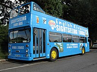 An open top bus advertising the "English Riviera"