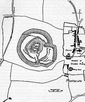 Drawing showing two concentric almost circular rings near the centre. The church and other buildings of the village are to the right.