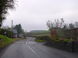 The telephone box at Twitchen (geograph 4273588).jpg