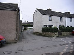 Modern road through old village. - geograph.org.uk - 78430.jpg
