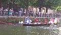 The Queen's Swan Uppers (white flag, far right) and swan uppers from the Vintners' Company (red flag) and Dyers' Company conducting swan upping on the Thames in Abingdon, in 2006