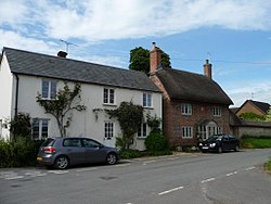 Contrasting houses, Wilsford (geograph 4001433).jpg
