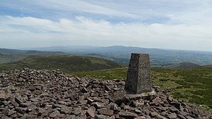 Trig point on Temple Hill with view towards Knockmealdown Mountains (geograph 6008151).jpg
