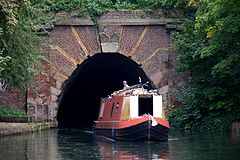 Canal boat and tunnel under Muriel Street, London.jpg