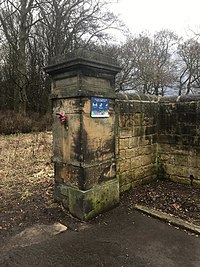 Farnley Hall Gates, stone column gatepost with old gate fixture, right side