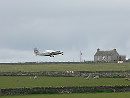 Britten-Norman Islander taking off at Sanday