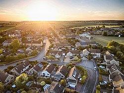 View of Stonesfield, Oxfordshire from a drone over Greenfield Crescent.jpg